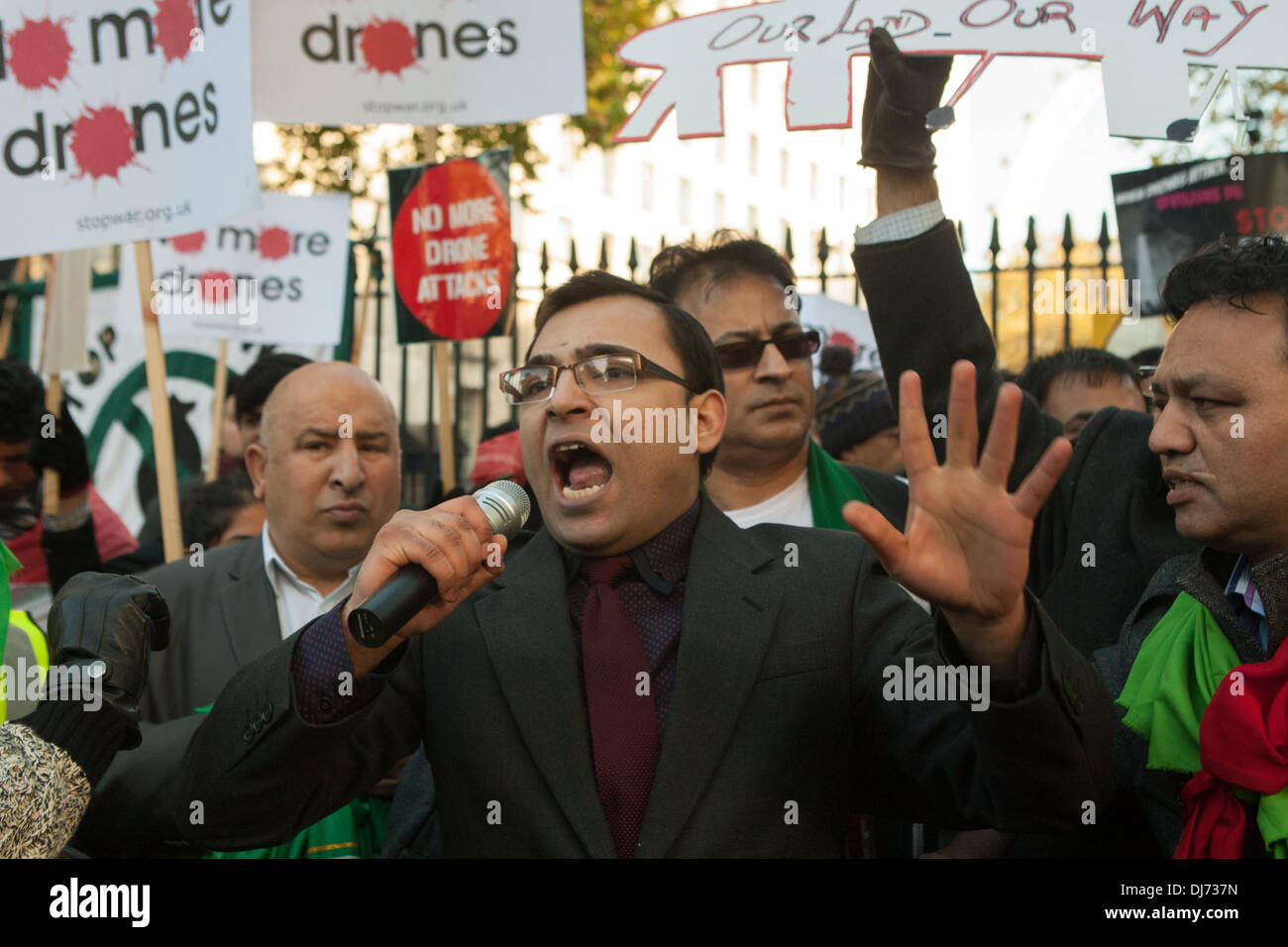 London, UK . 23rd Nov, 2013. Members and supporters of Pakistan Tehreek-e-Insaf (the Pakistani political party headed by Imran Khan) in the UK march from 10 Downing Street to the US Embassy in London to protest US drones strikes in Pakistan. London, UK 23 November 2013 Credit:  martyn wheatley/Alamy Live News Stock Photo