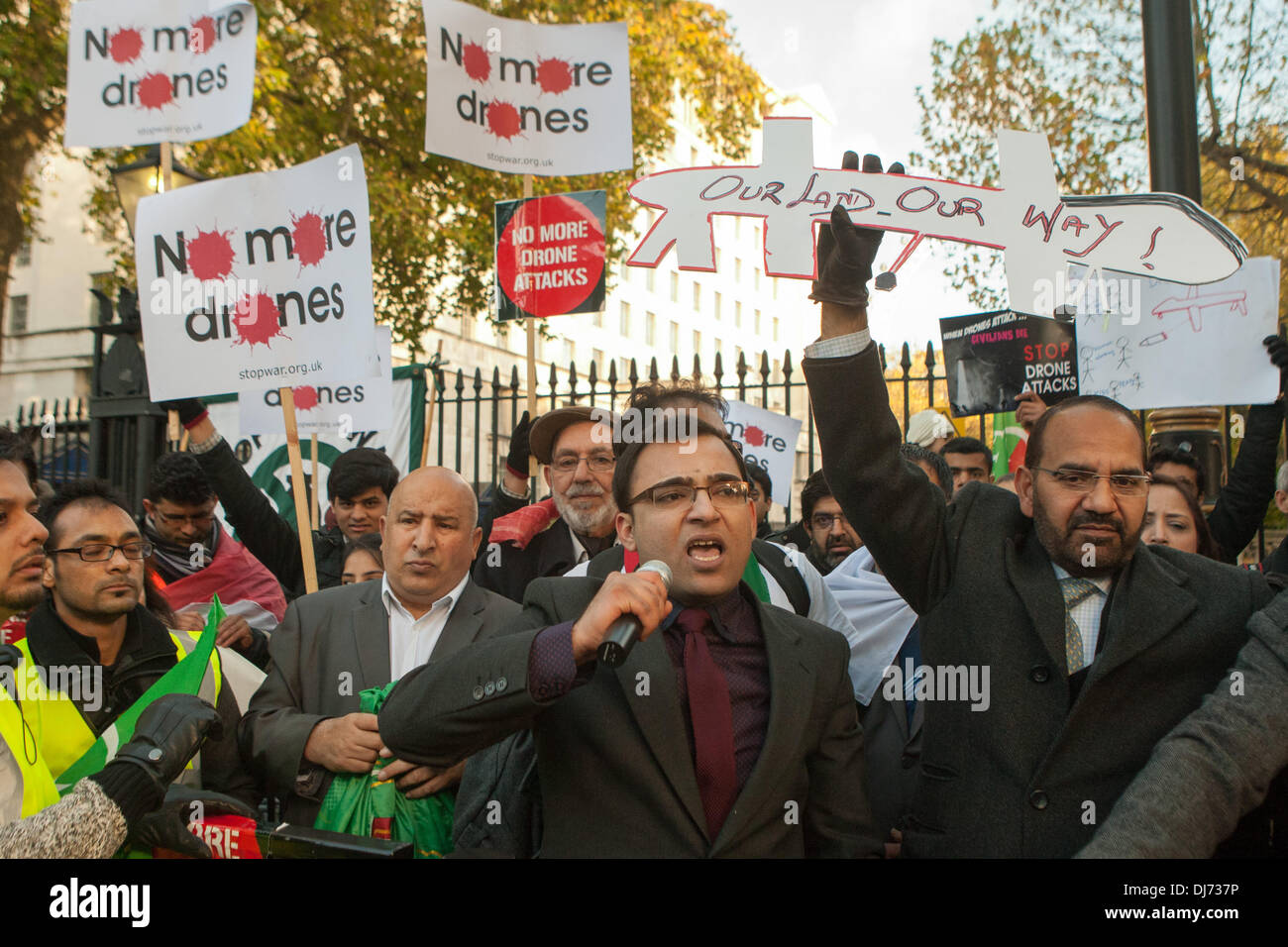 London, UK . 23rd Nov, 2013. Members and supporters of Pakistan Tehreek-e-Insaf (the Pakistani political party headed by Imran Khan) in the UK march from 10 Downing Street to the US Embassy in London to protest US drones strikes in Pakistan. London, UK 23 November 2013 Credit:  martyn wheatley/Alamy Live News Stock Photo