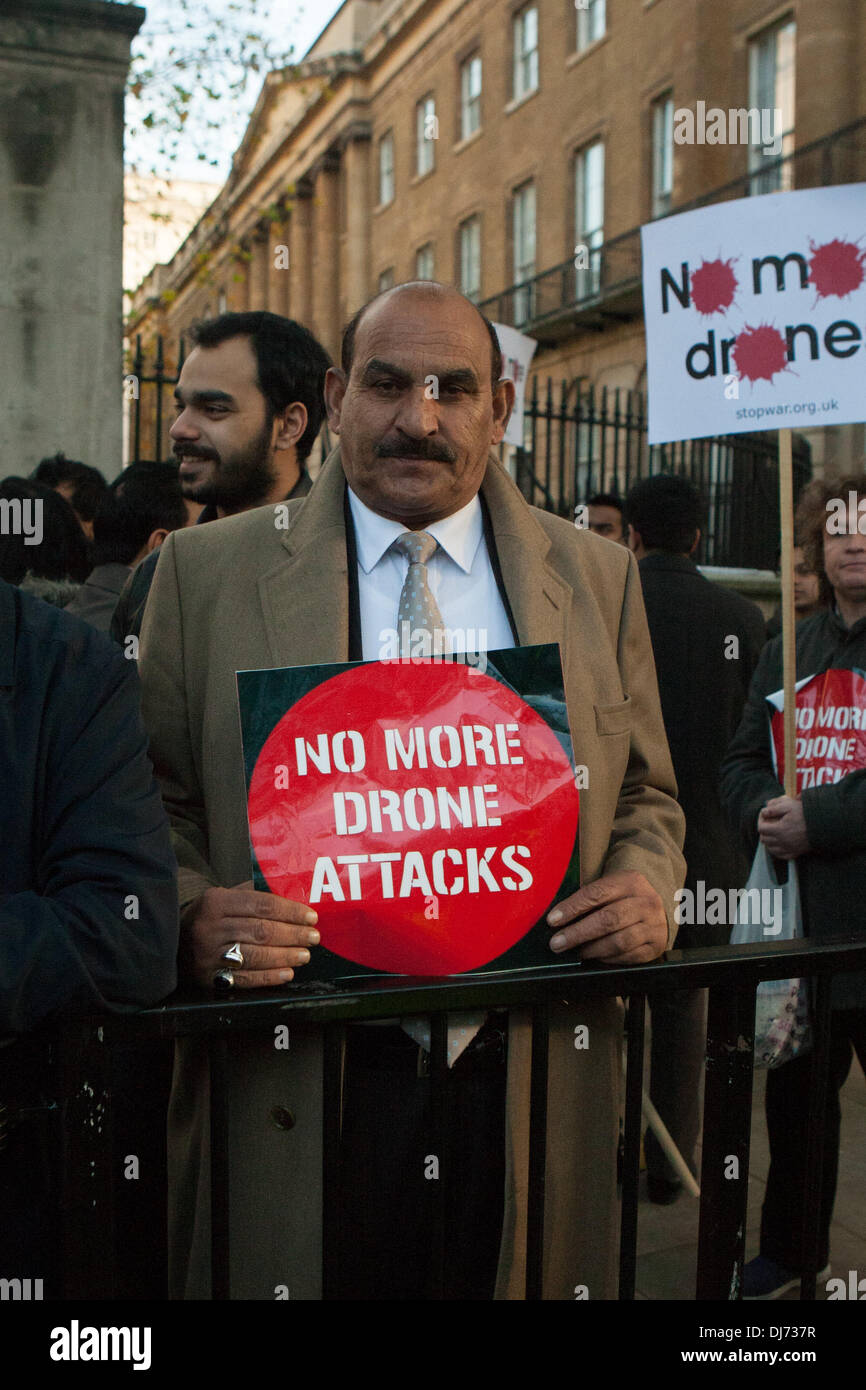 London, UK . 23rd Nov, 2013. Members and supporters of Pakistan Tehreek-e-Insaf (the Pakistani political party headed by Imran Khan) in the UK march from 10 Downing Street to the US Embassy in London to protest US drones strikes in Pakistan. London, UK 23 November 2013 Credit:  martyn wheatley/Alamy Live News Stock Photo