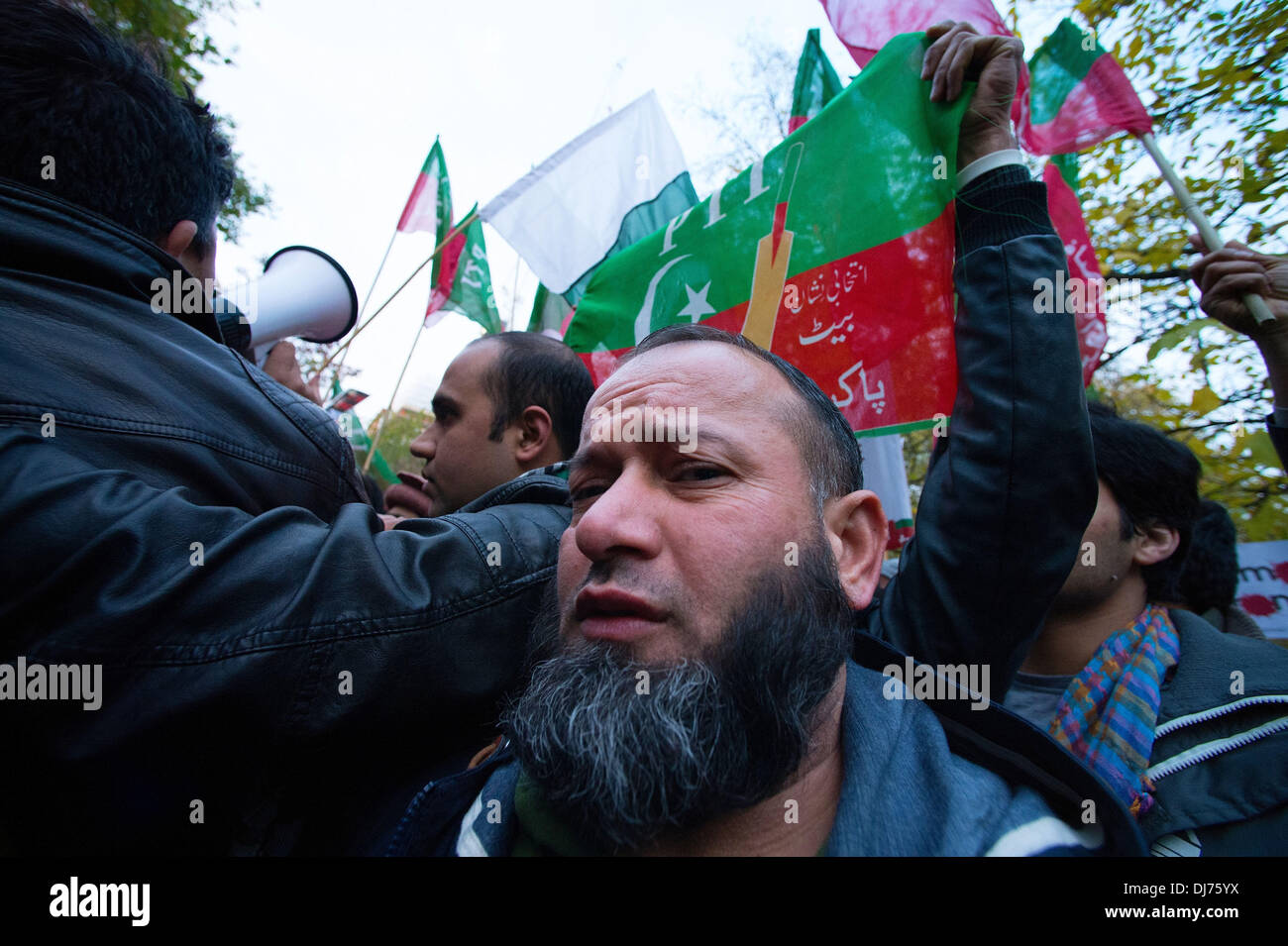 London, UK, UK. 23rd Nov, 2013. Members and supporters of Pakistan Tehreek-e-Insaf march from 10 Downing street to the US embassy in London demanding an end to the use of US drone strikes in Pakistan. Credit:  Gail Orenstein/ZUMAPRESS.com/Alamy Live News Stock Photo