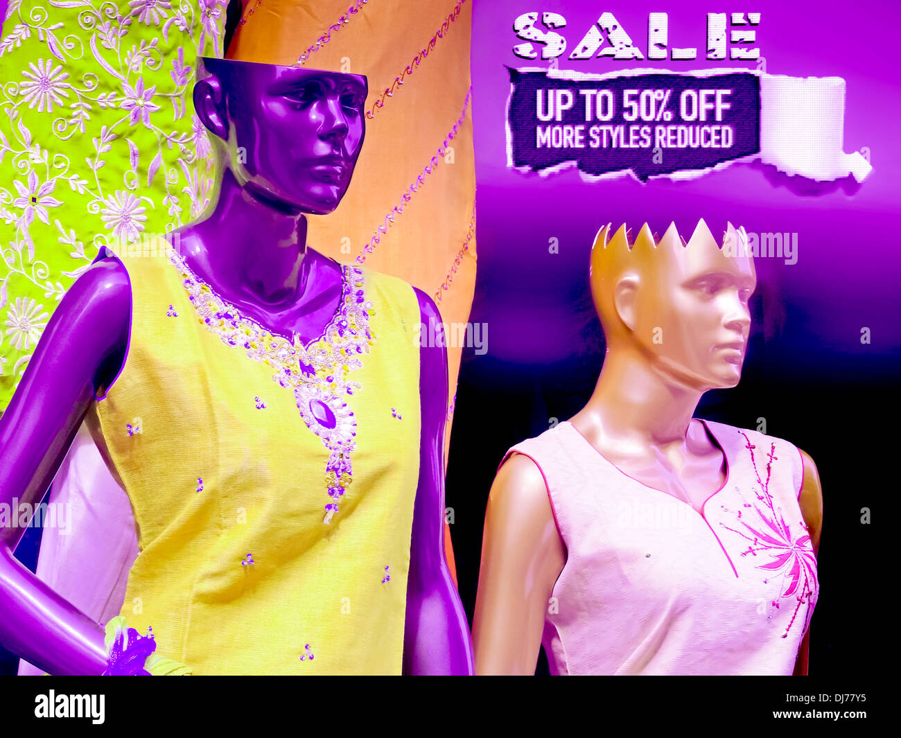 The Mannequins & Traditional Cloths, Punjabi dresses arranged on window display with 50 % Discount board at a shop, India Stock Photo