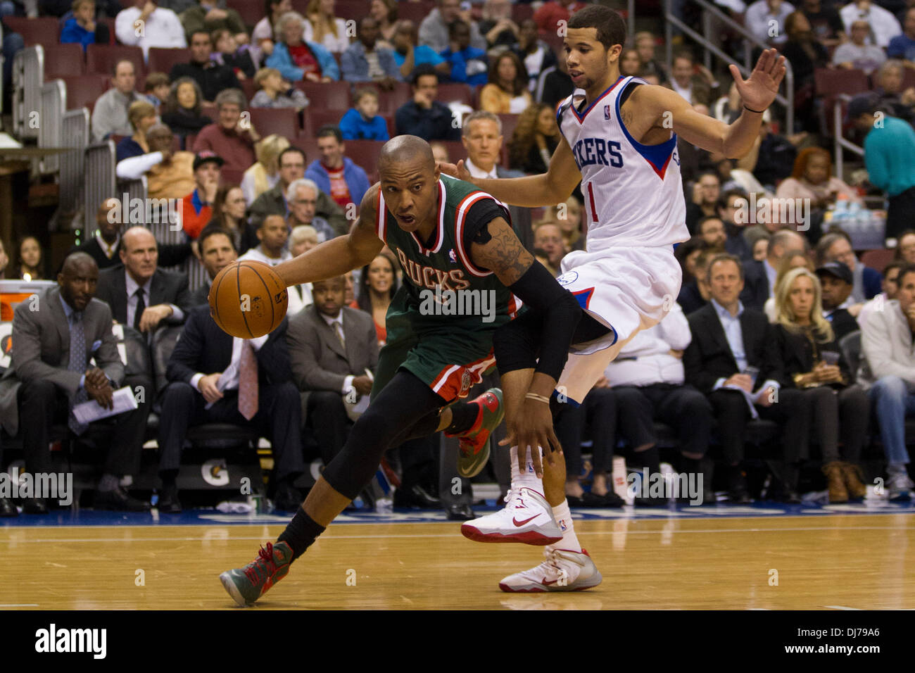 November 22, 2013: Milwaukee Bucks small forward Caron Butler (3) gets past Philadelphia 76ers point guard Michael Carter-Williams (1) with the ball during the NBA game between the Milwaukee Bucks and the Philadelphia 76ers at the Wells Fargo Center in Philadelphia, Pennsylvania. The 76ers win 115-107 in overtime. Christopher Szagola/Cal Sport Media Stock Photo