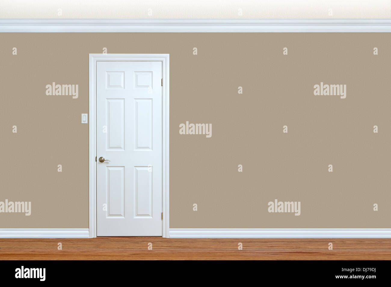 Bedroom wall with door, baseboard and crown molding with room for text Stock Photo