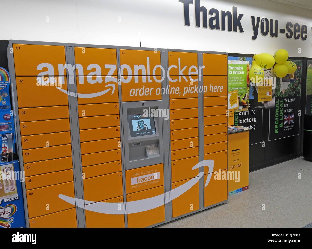 Orange AmazonLocker in a Co-Op food store UK Stock Photo