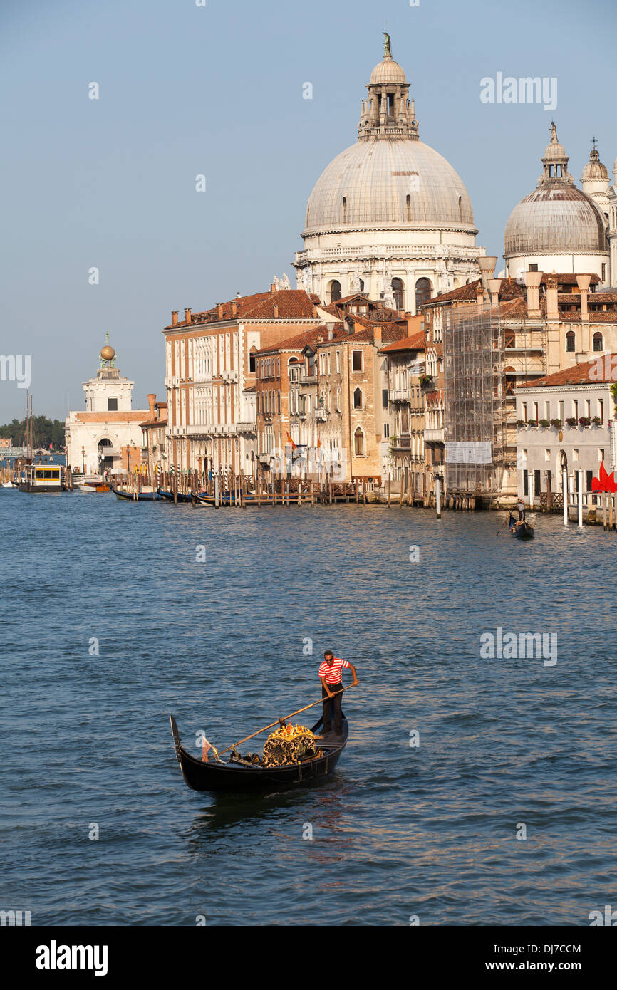 Some tourists on a Gondola in Venice, Italy, Europe Stock Photo