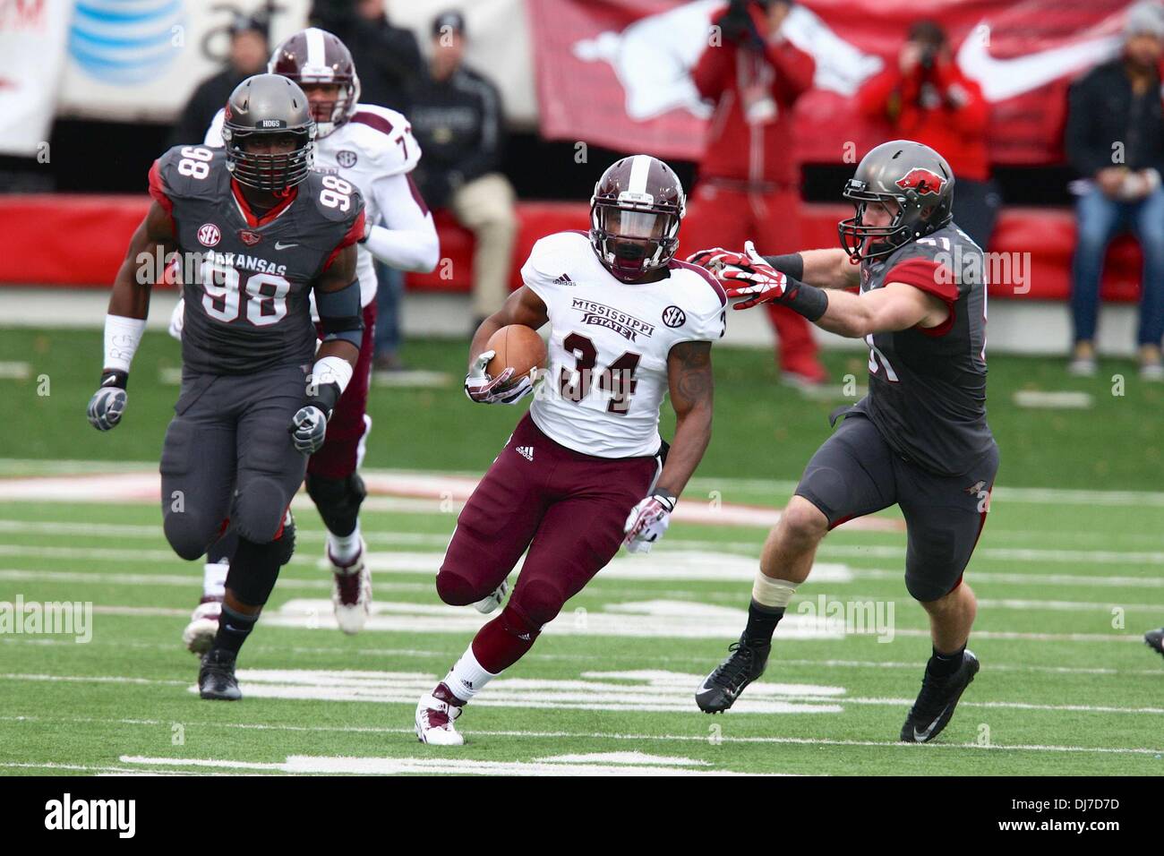 Little Rock, Arkansas, USA. 23 Nov 2013. Razorback linebacker Brooks Ellis 51 works to catch up