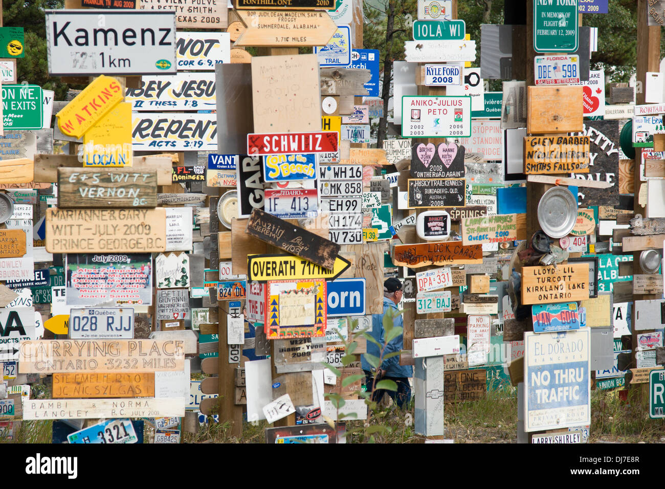 A close-up view of some of the many signposts in the signpost forest of Watson Lake, Yukon territory Stock Photo