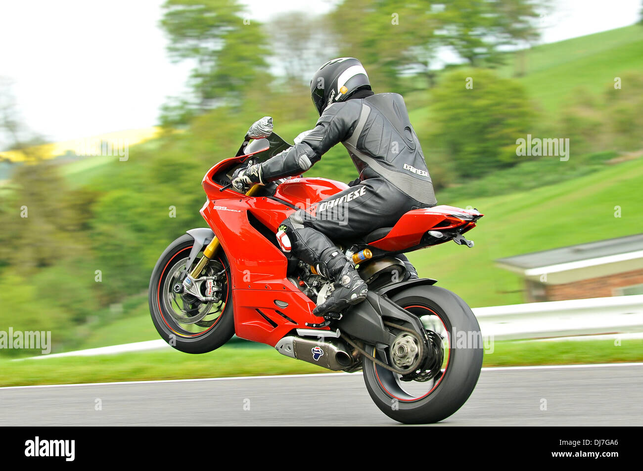 Motorcycle pulling a wheelie Stock Photo