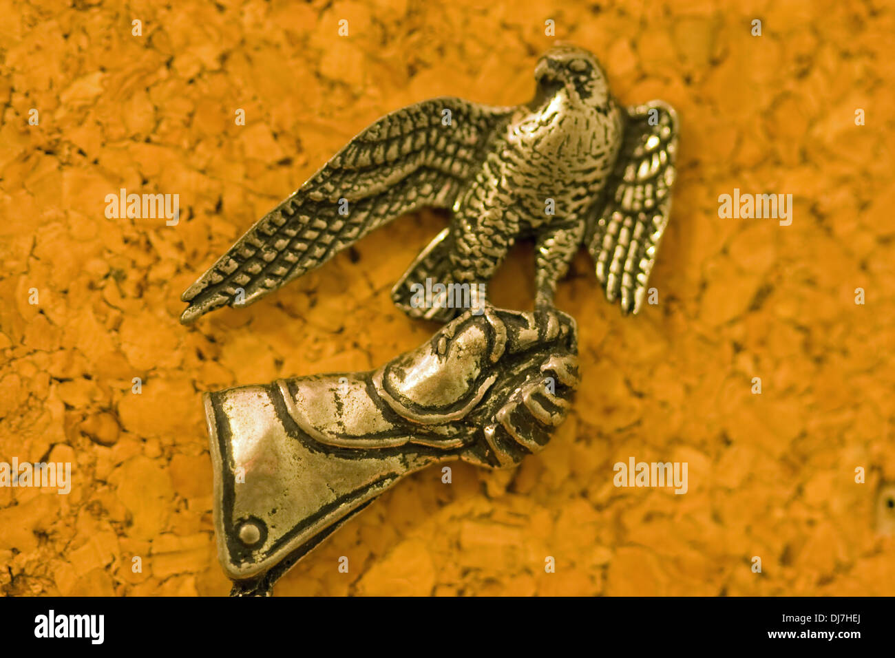 pewter falcon on pewter falconers glove. Stock Photo