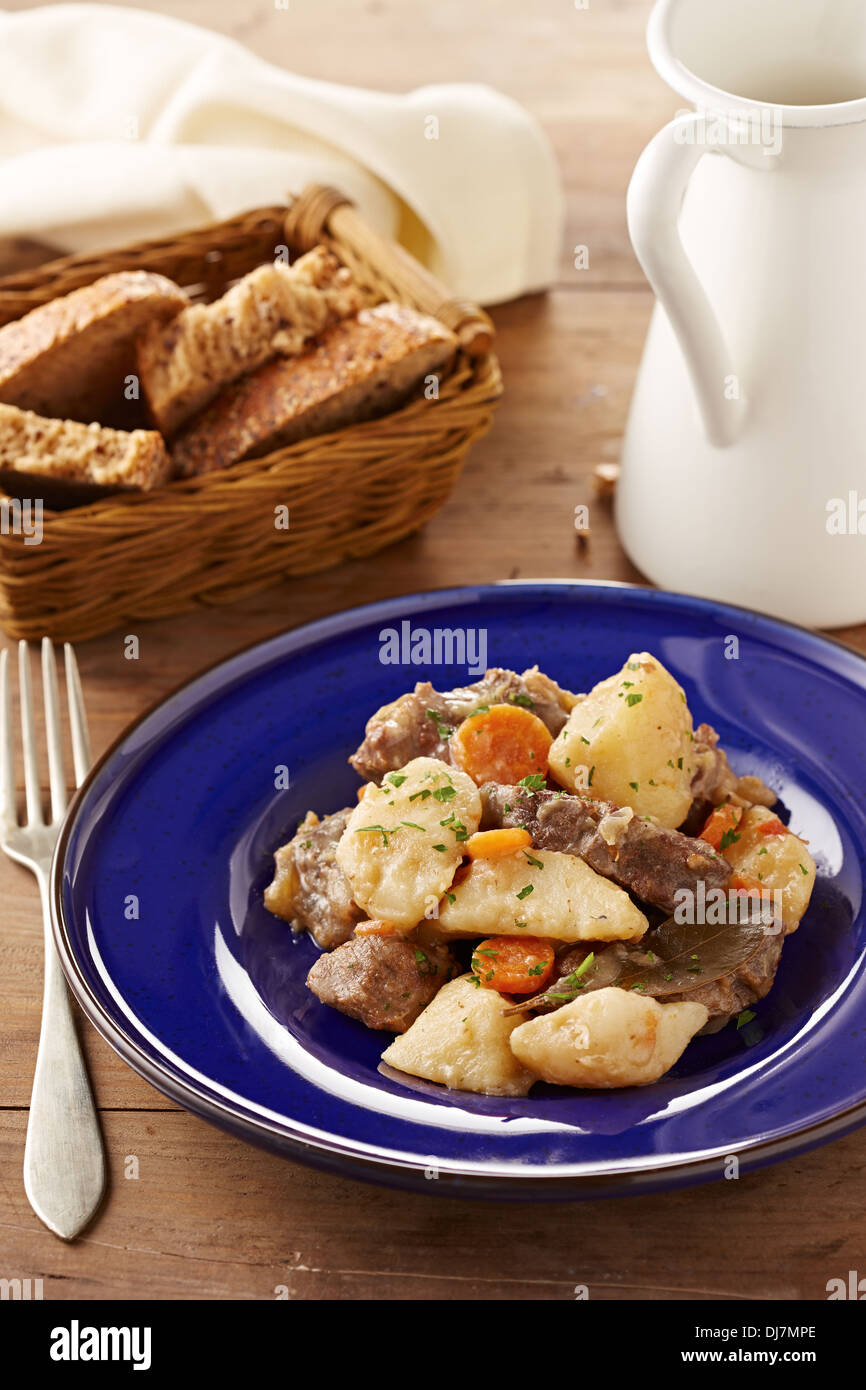 Beef stew with vegetables on a dish Stock Photo