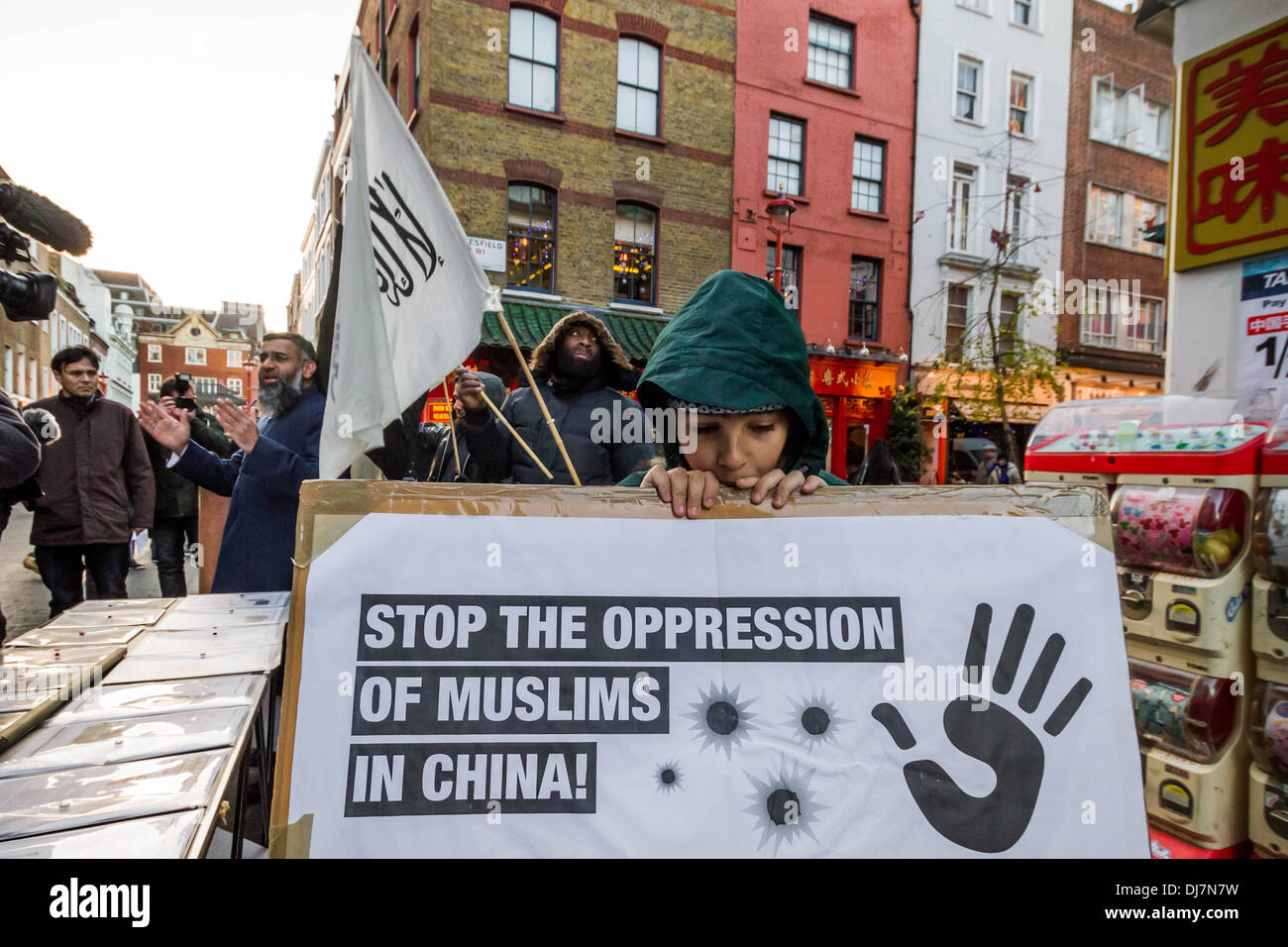 U.K. based Islamists protested in London’s Chinatown to raise awareness of the on-going oppression of Muslims in China. Stock Photo