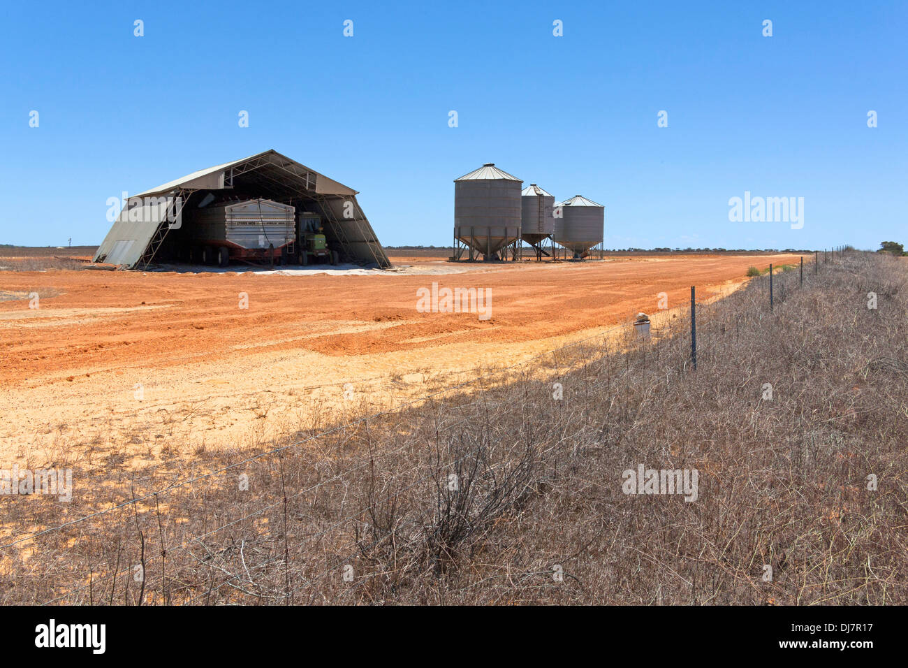 Grain silos and farm shed, Murchison Western Australia Stock Photo