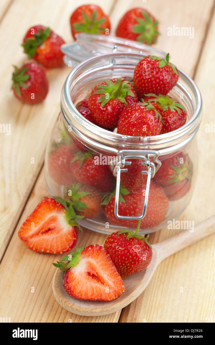 Strawberries and jar Stock Photo Alamy