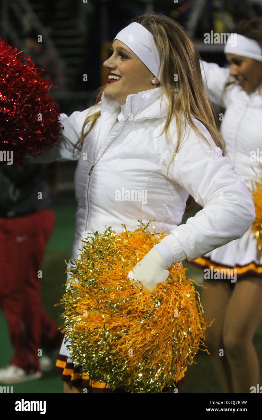 Boulder, CO, USA. 23rd Nov, 2013. November 23, 2013: A USC cheerleader perfroms a routine duirng the game against Colorado at frigid Folsom Field in Boulder. Credit:  csm/Alamy Live News Stock Photo