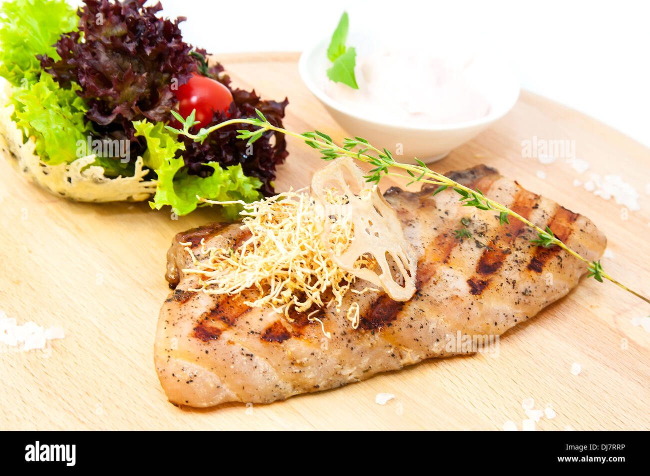 Catfish steak cooking on a grill in the restaurant Stock Photo Alamy