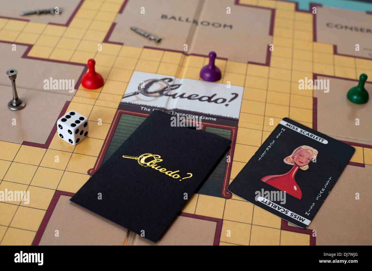 Close-up of the board and pieces of the Cluedo board game Stock Photo