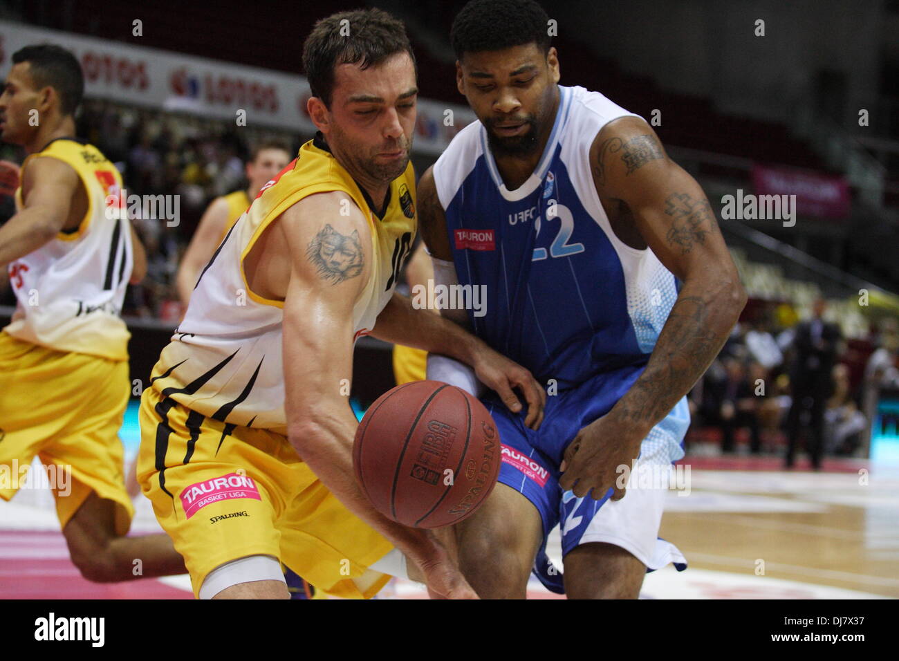 Sopot, Poland 24th, November 2013 Polish Basketball Extraleague - Tauron  Basket Liga. Trefl Sopot v Kotwica Kolobrzeg game at ERGO Arena sports hall  in Sopot. Karron Johnson (22) in action against Marcin