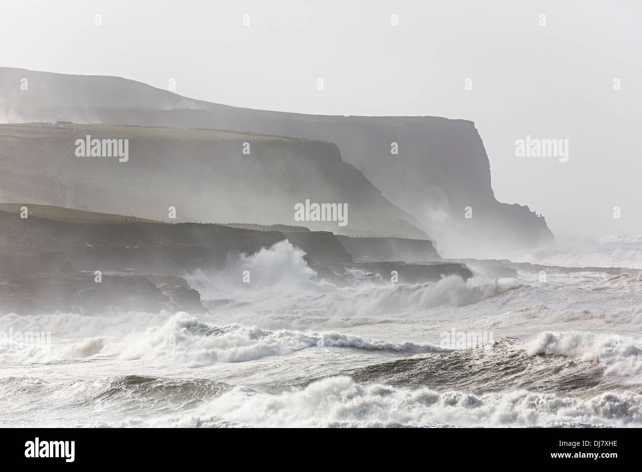 Storm waves at Doolin with the Cliffs of Moher in background, Co. Clare, Ireland Stock Photo
