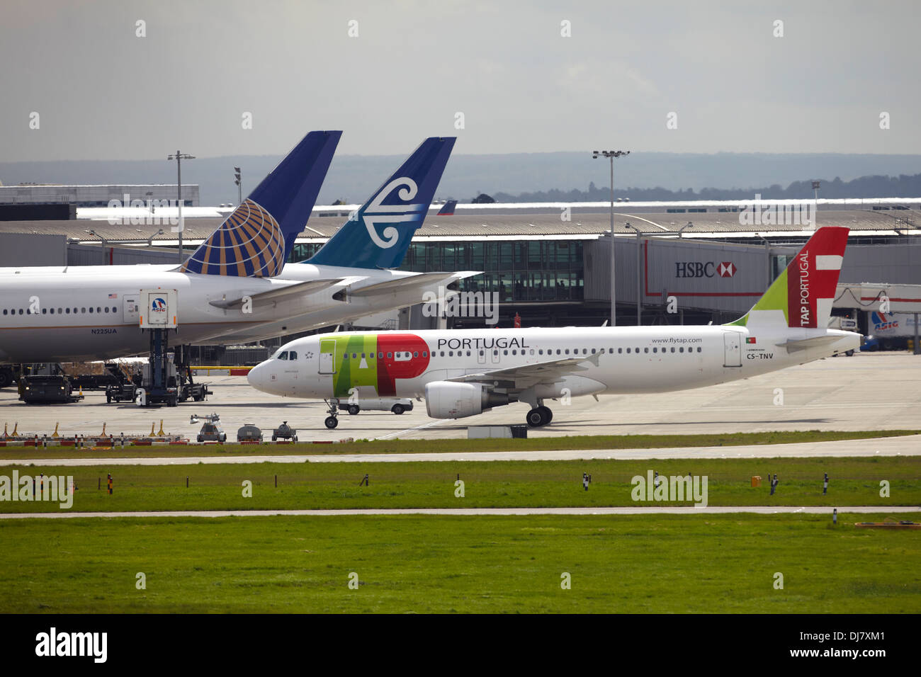 tap-portugal-airbus-a320-at-london-heathrow-airport-stock-photo-alamy