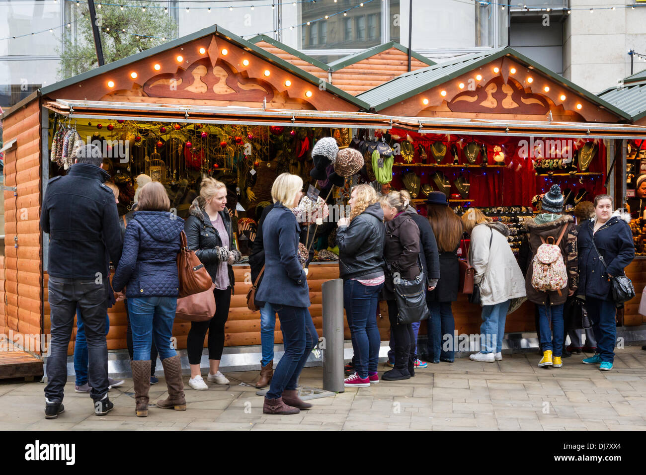 Manchester, UK. 24th Nov, 2013. Visitors flocking to the Manchester Christmas Markets in its 15th Year Credit:  Andrew Barker/Alamy Live News Stock Photo