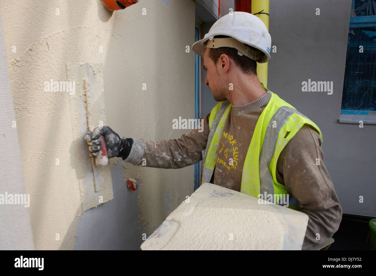 Rendering an external wall insulation system EWI as part of the UK ...