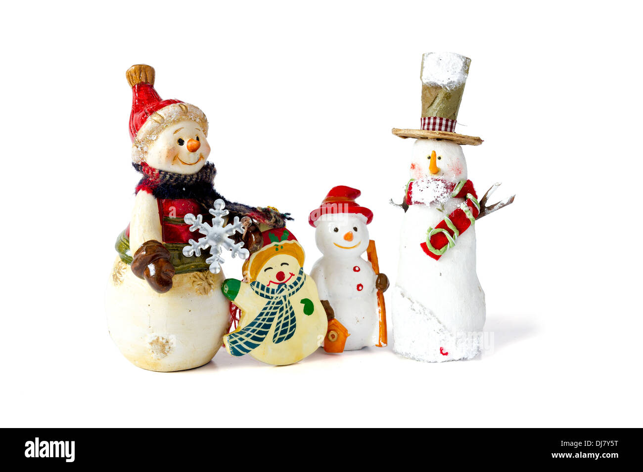 Cheerful family of snowmen, on a white background Stock Photo
