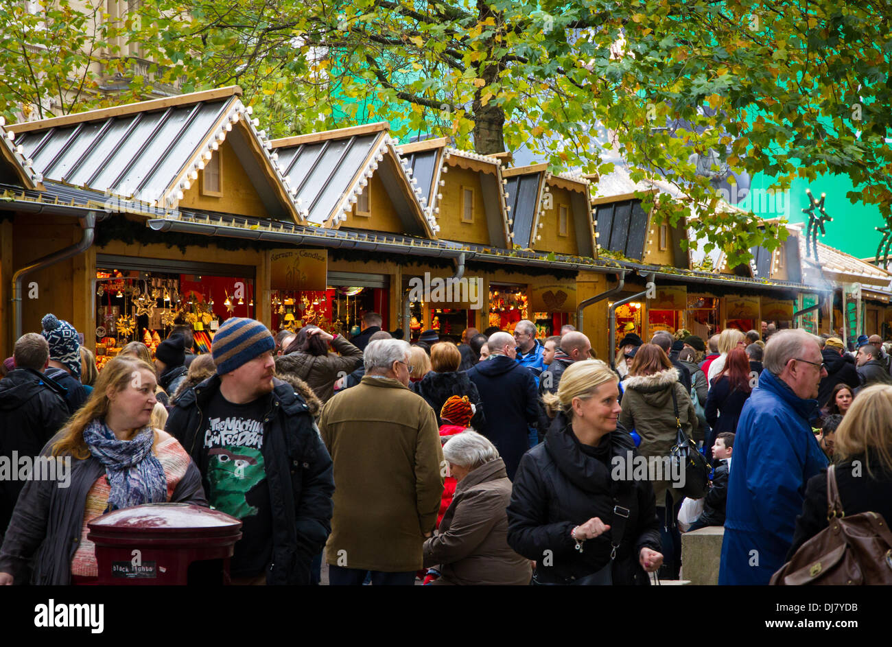 Manchester, UK. 24th Nov, 2013. Visitors flocking to the Manchester Christmas Markets in its 15th Year Credit:  Andrew Barker/Alamy Live News Stock Photo