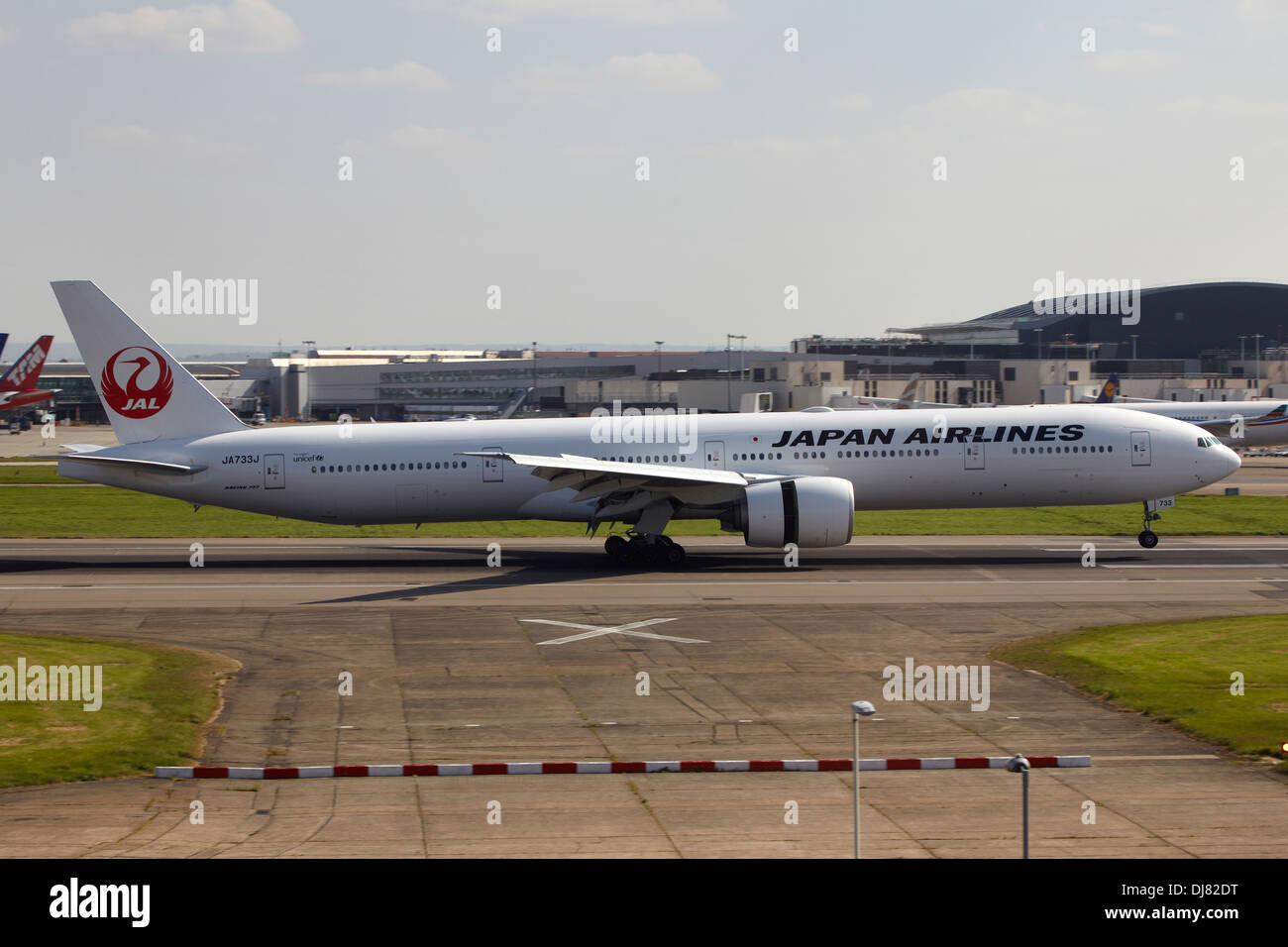 Japan Airlines Boeing 777 landing at London Heathrow Airport Stock Photo