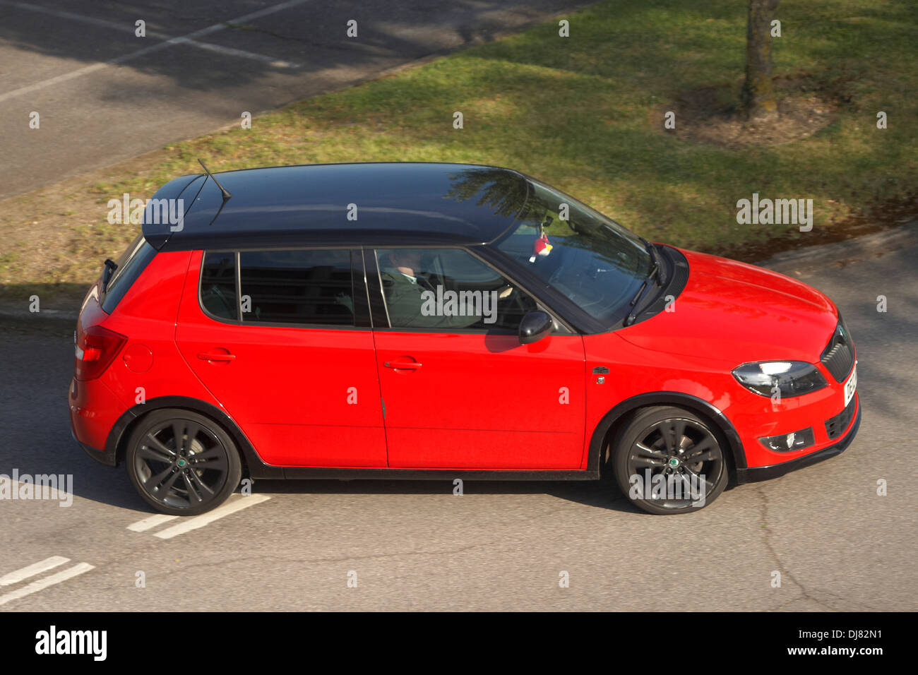 Red skoda Fabia vrs supermini car with black roof Stock Photo - Alamy