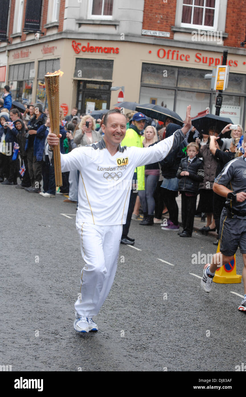 Olympic Torch bearer Northampton 2012 Stock Photo Alamy