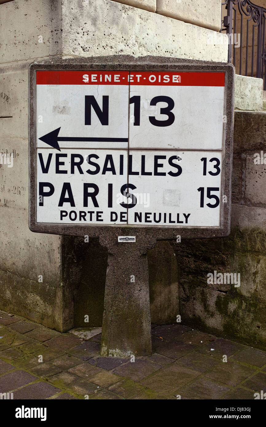 Old style of French road sign at Saint-Germain-en-Laye, France Stock Photo