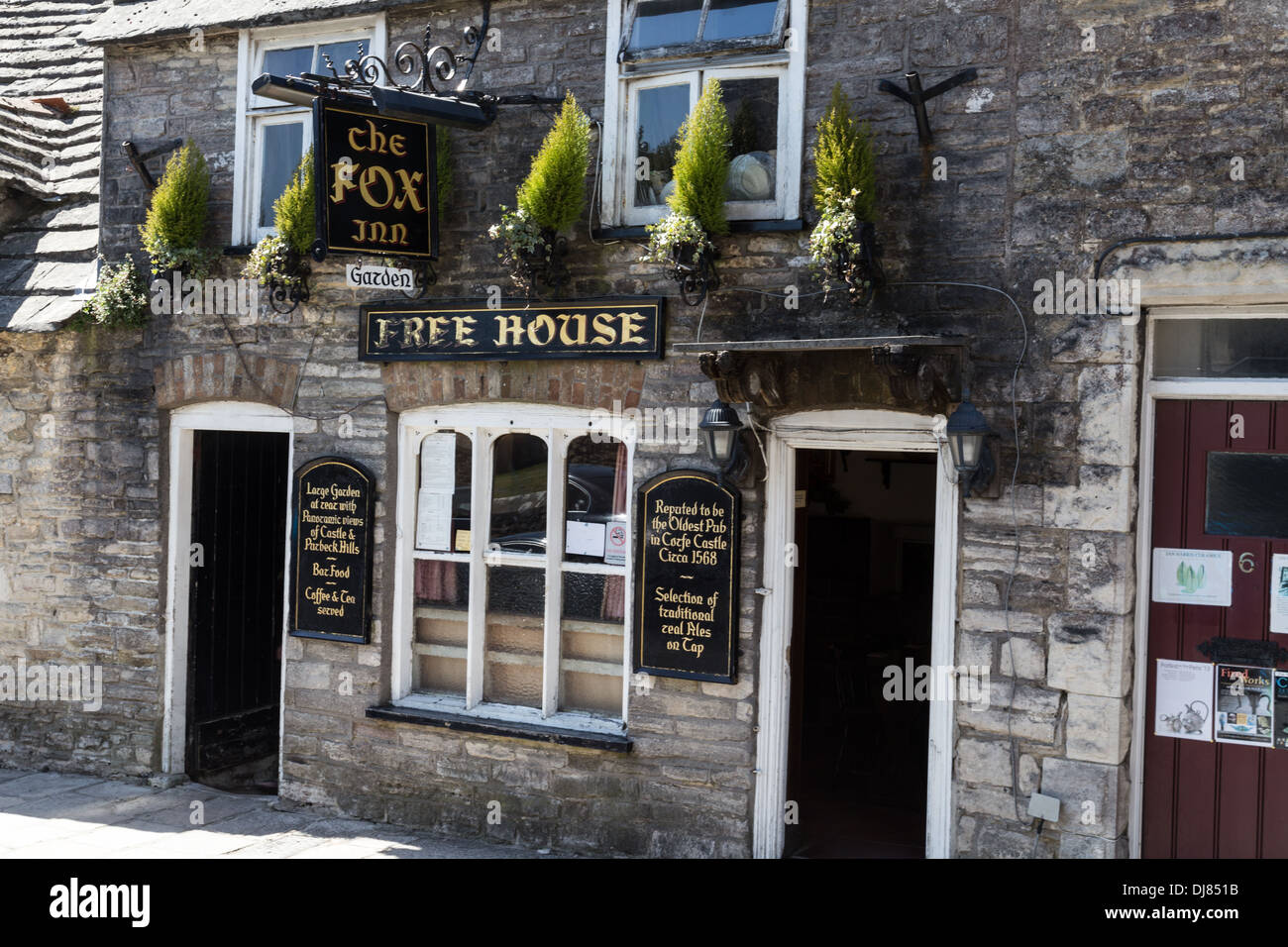 The Fox 14th Century English pub in Corfe Castle village, Dorset. UK. Stock Photo