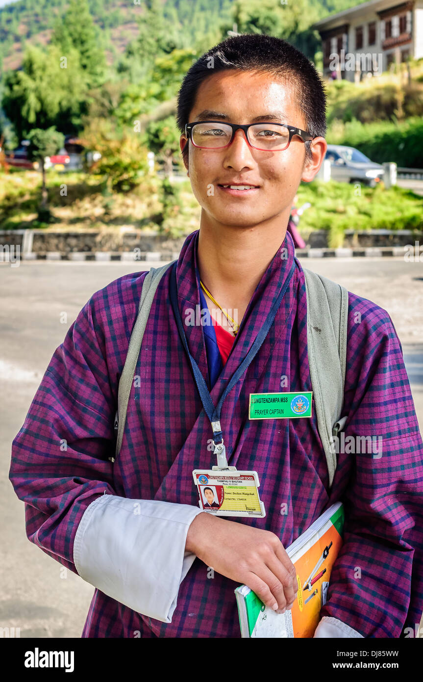 Portrait of a Bhutanese bespectacled boy Student in uniform going for school with copy space Stock Photo