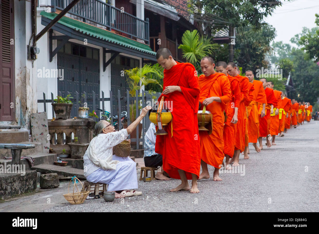 Alms giving ceremony in Luang Prabang, Laos Stock Photo