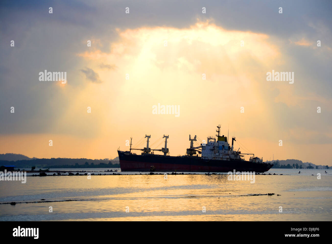 Ship at sunset dusk Stock Photo