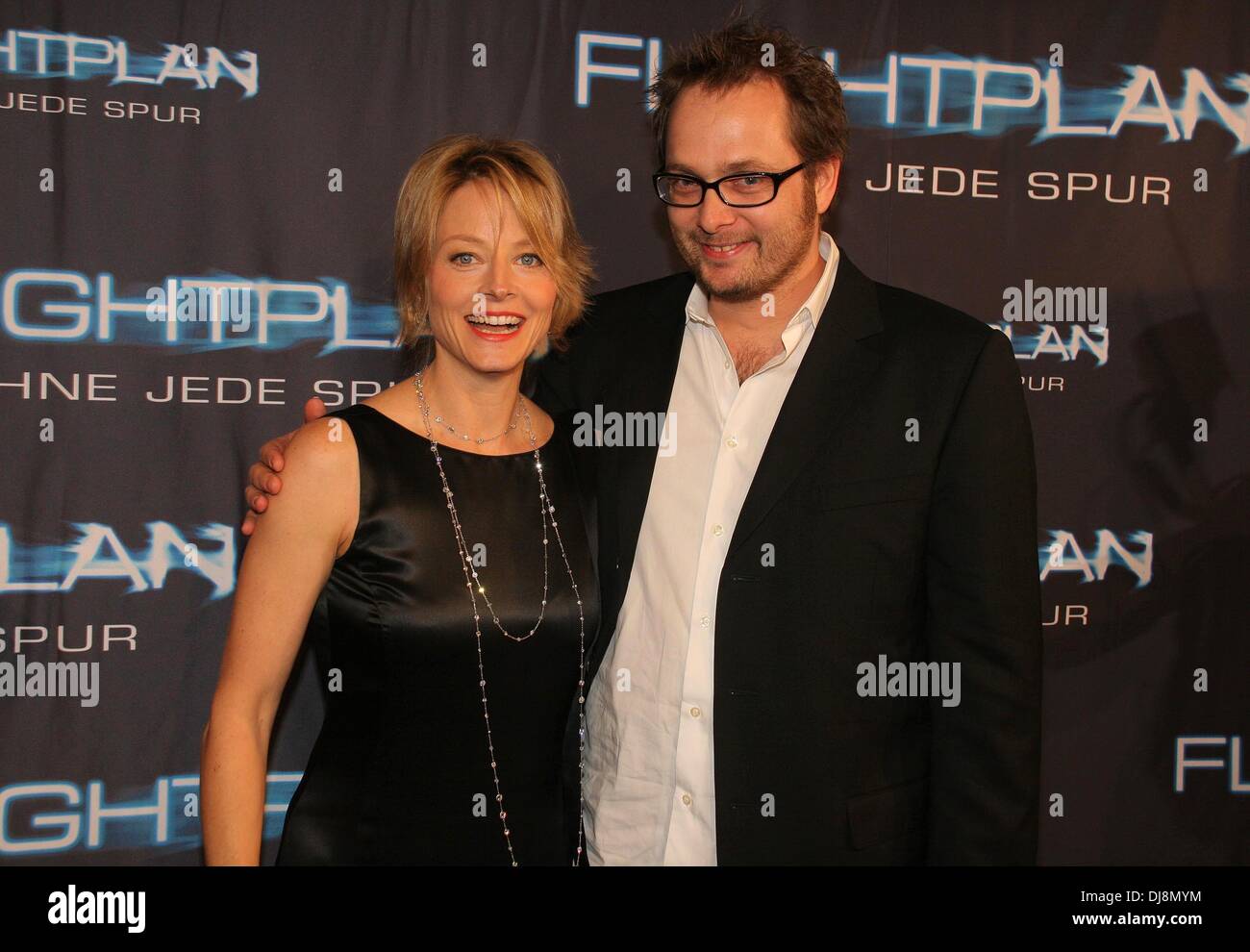 Actress Jodie Foster and director Robert Schwentke during the premiere of 'Flightplan' in Berlin. Stock Photo