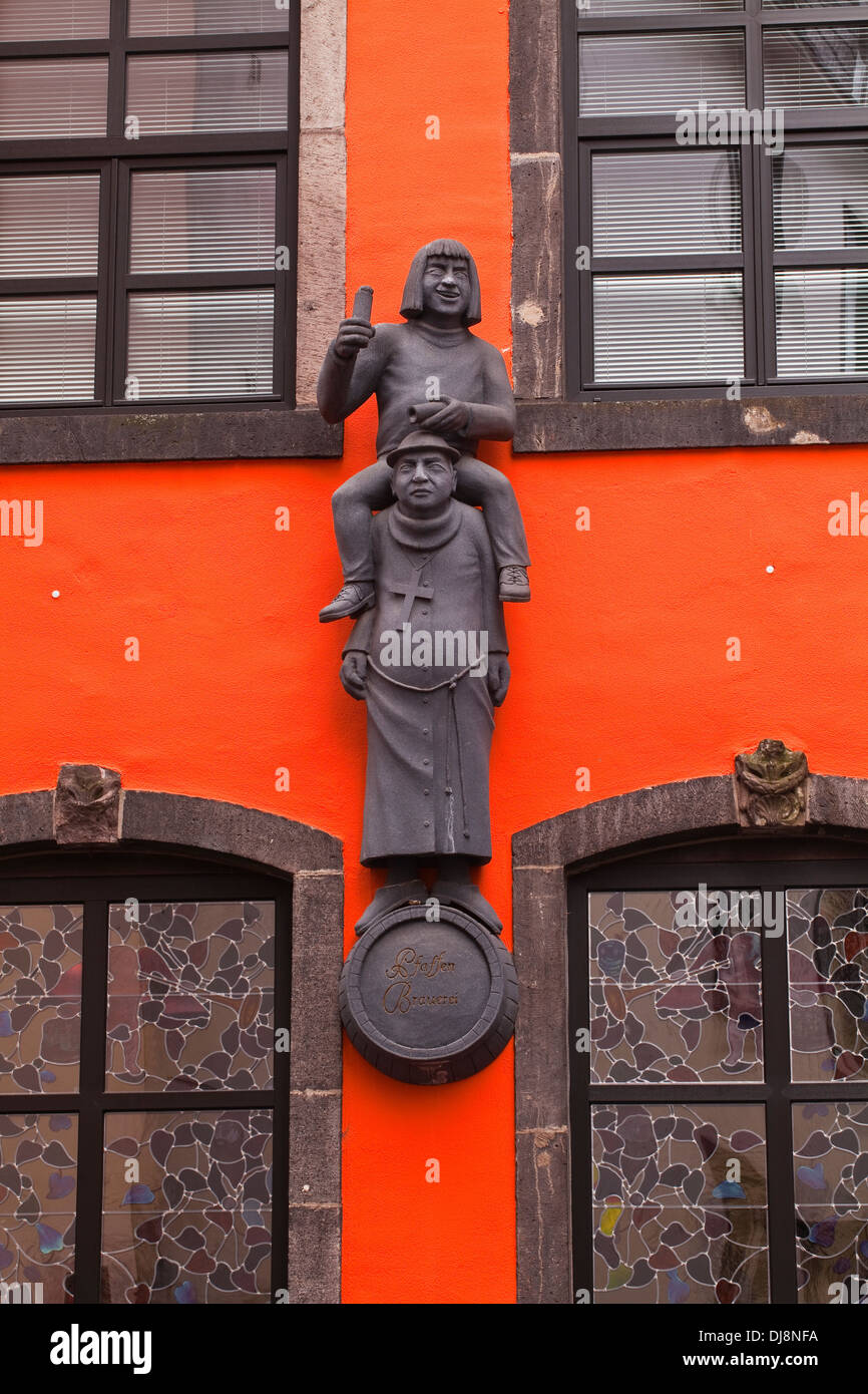 A Pfaffen Brauerei carved wooden pub sign in the old town, Cologne. Stock Photo