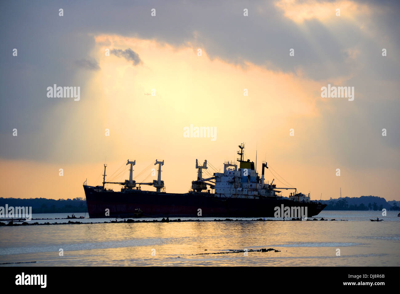 Ship at sunset dusk Stock Photo