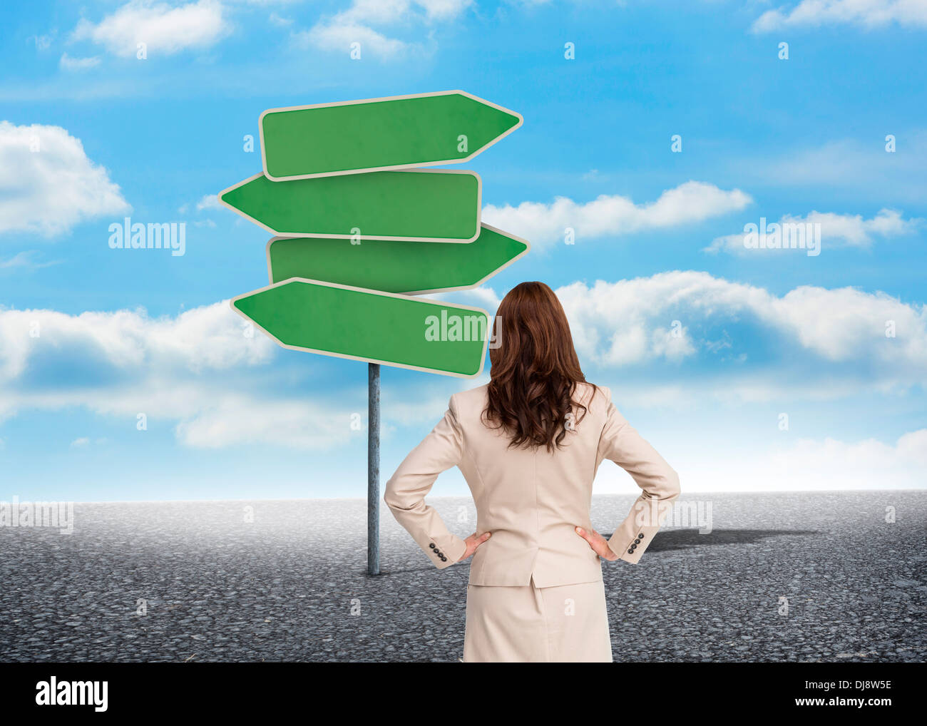 Female standing pointing back hi-res stock photography and images - Alamy