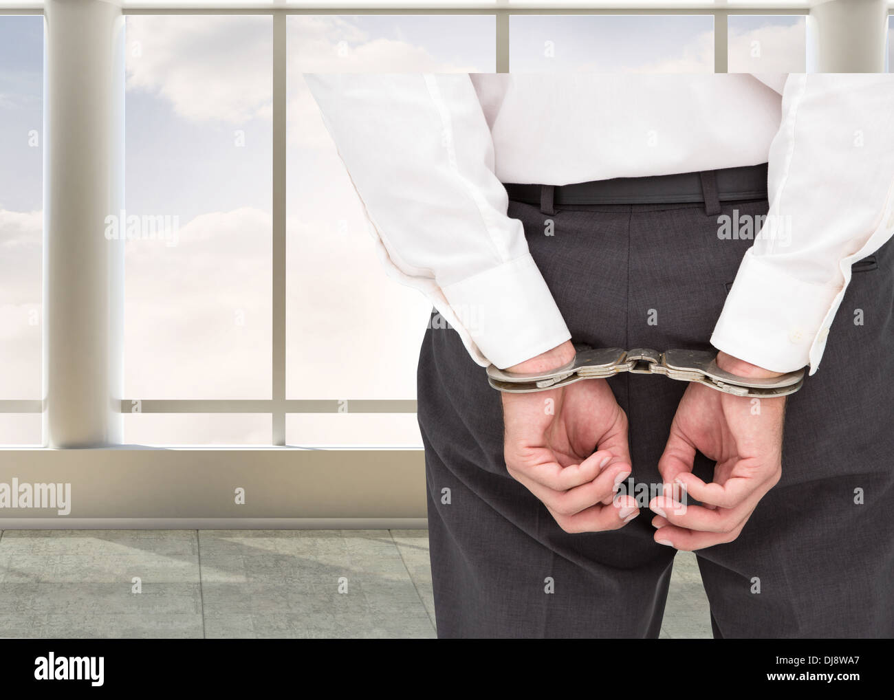 Close up on classy businessman wearing handcuffs Stock Photo Alamy