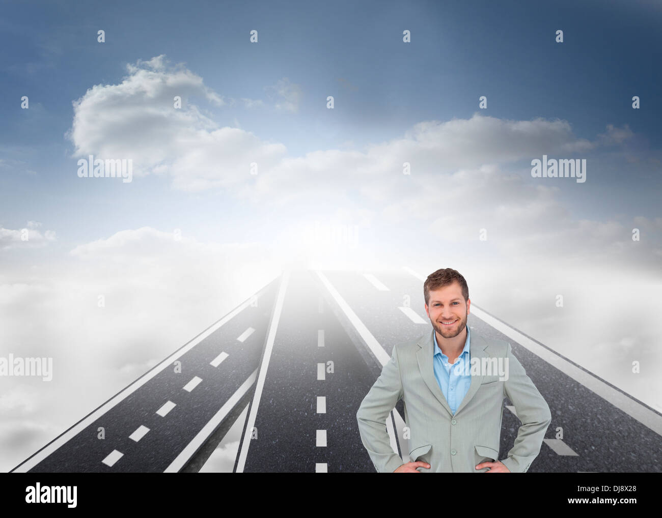 Stylish man smiling with hands on hips Stock Photo