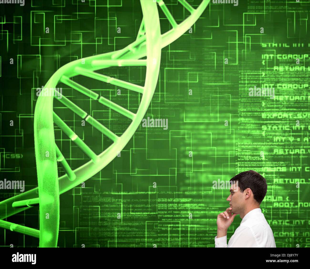 Thoughtful young businessman looking at dna spiral Stock Photo