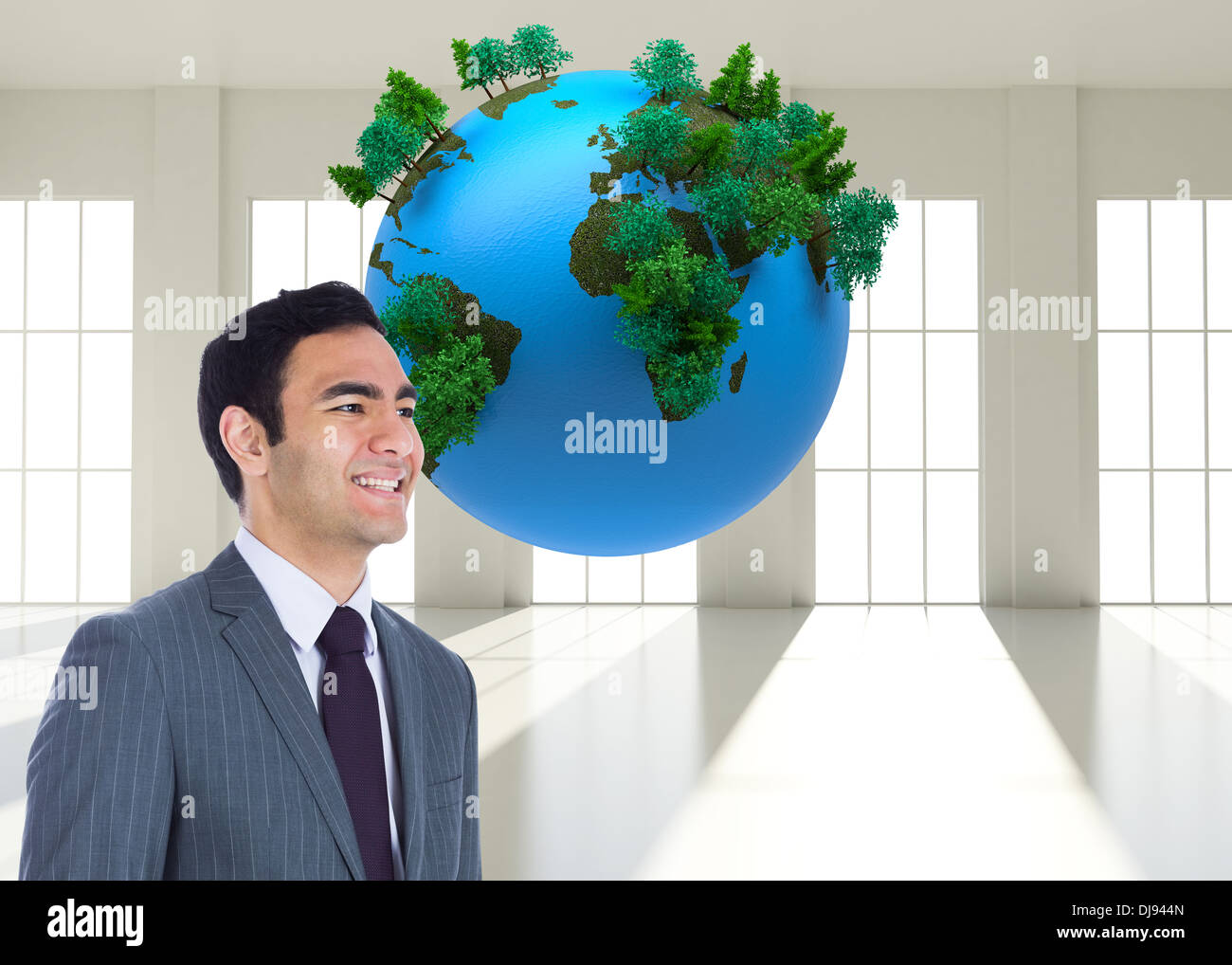 Composite image of smiling businessman standing Stock Photo - Alamy