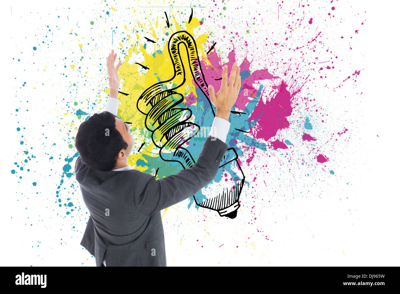 Composite image of businessman with arms raised Stock Photo - Alamy