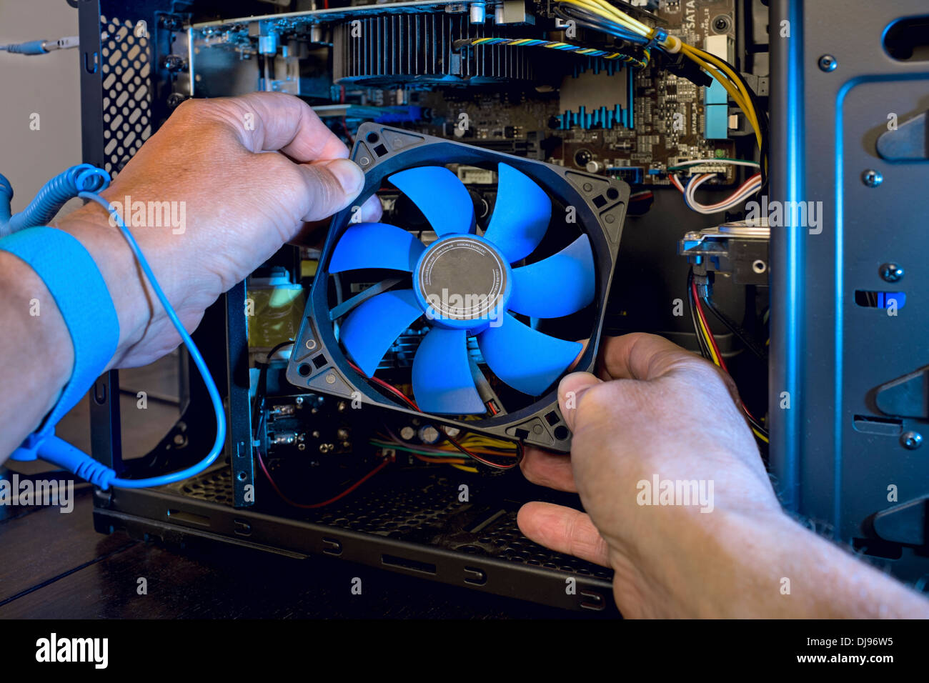 Repairs inside a desktop computer. Stock Photo