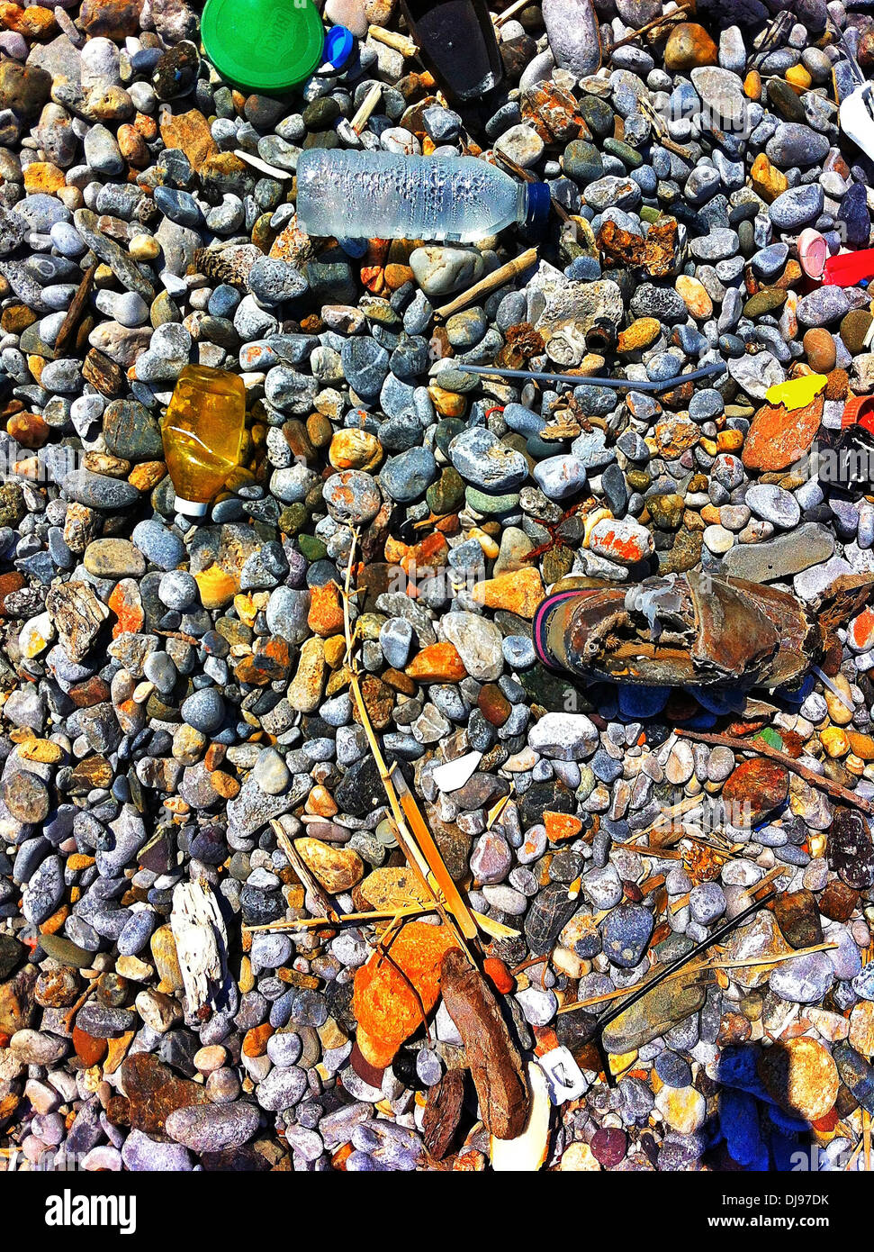Garbage collected on rocky beach - Smartphone Captured Stock Image