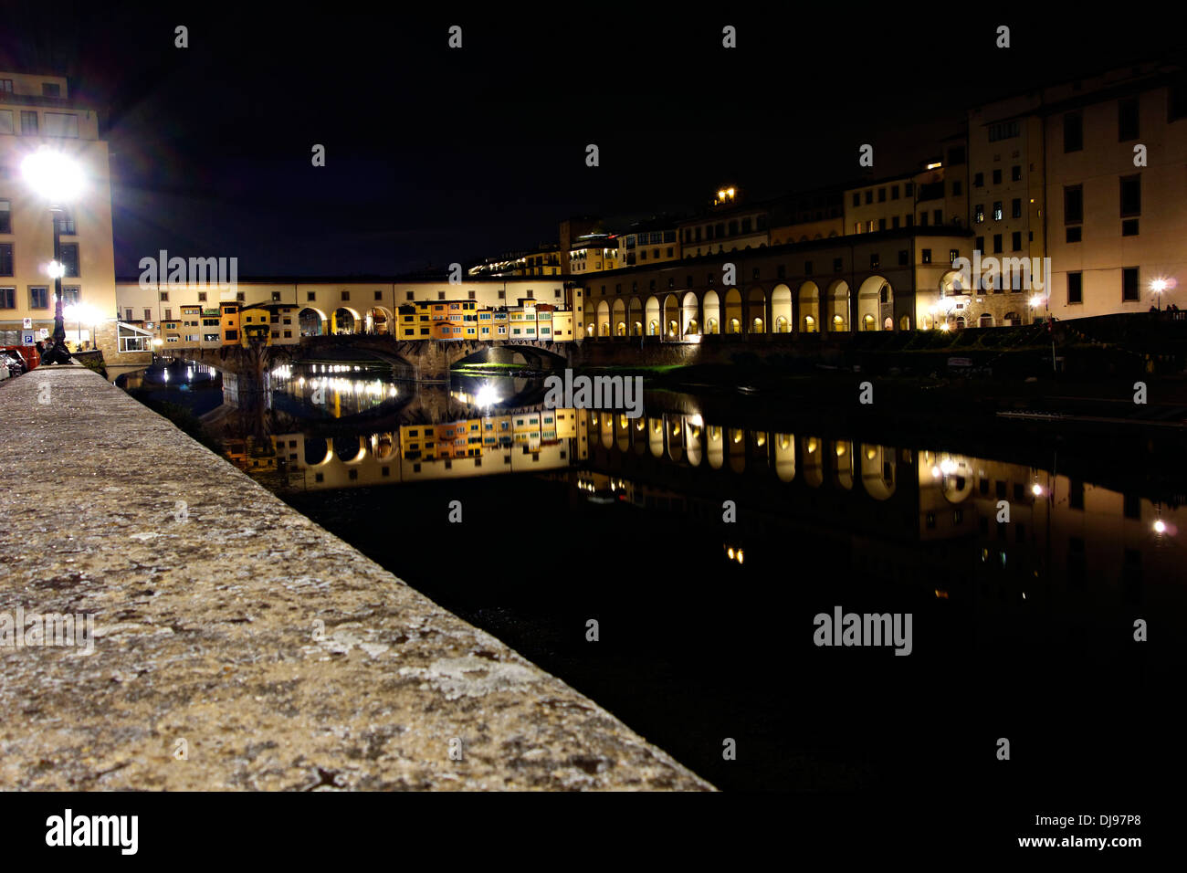 Ponte Vecchio bridge over the River Arno at night , Florence, Italy Stock Photo