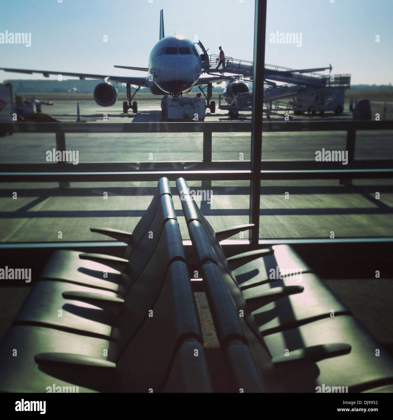 Empty seats in airport waiting area - Smartphone Captured Stock Image