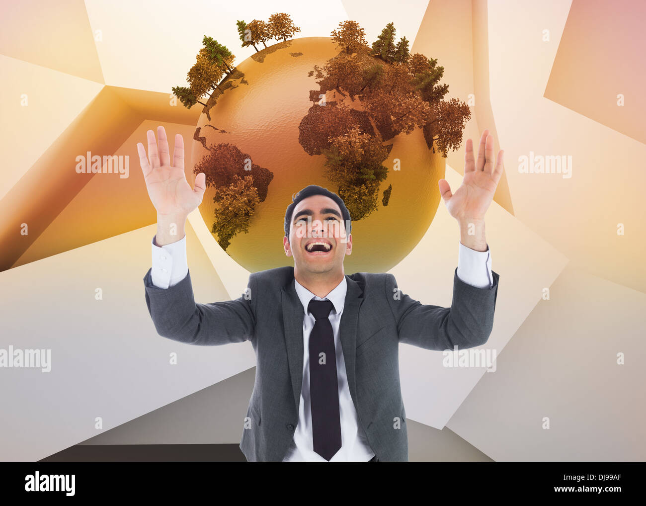 Composite image of excited businessman with arms raised Stock Photo - Alamy