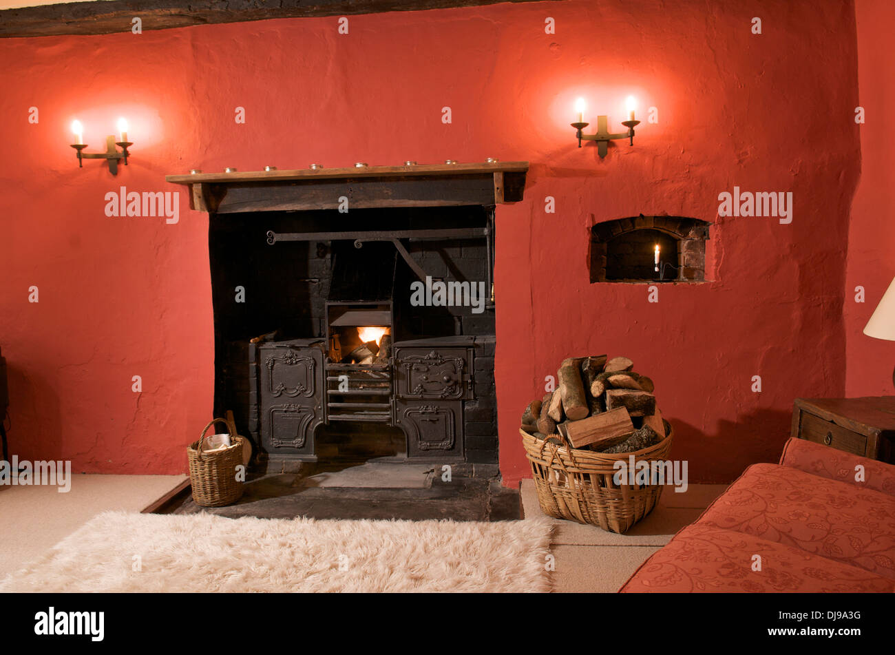 Old fashioned range in fireplace of holiday cottage, Wales, UK Stock Photo